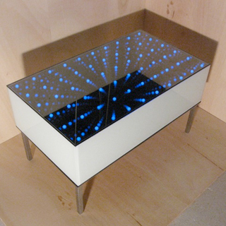 Illustration for article titled Illuminating Table Opens Portal to New Dimension, Doesn't Require LSD